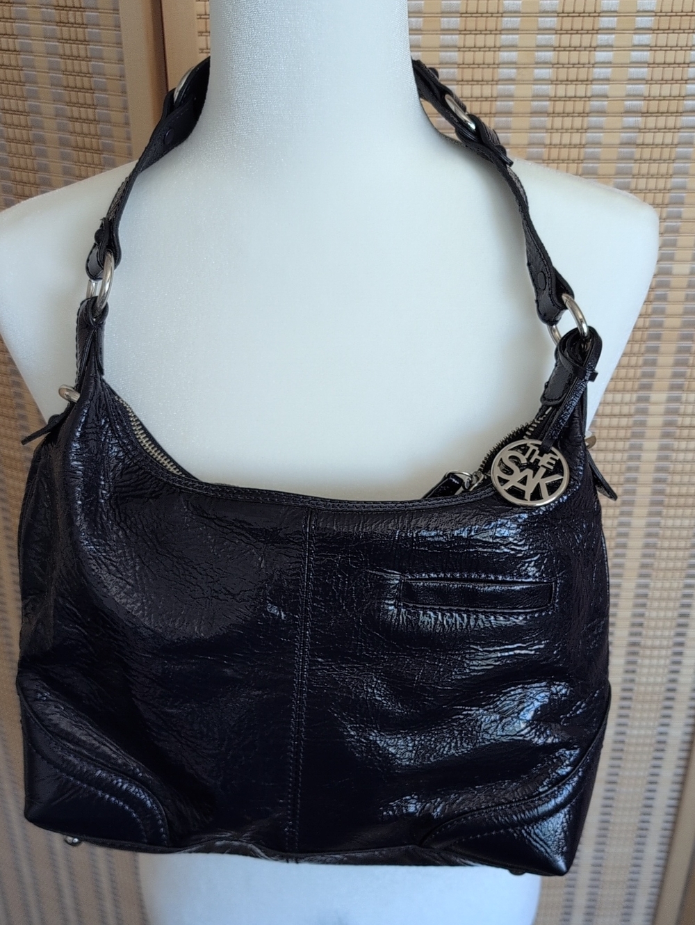 The Sak Navy Faux Leather Shoulder Bag with Branded Charm